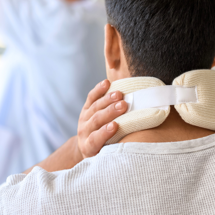Neck injury and recovery support image representing injury lawyers ann arbor handling spinal and soft tissue injury claims